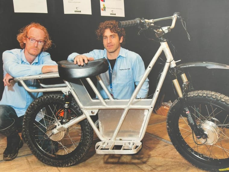 Anthony Clyde and Daryl Neal with their two-wheel-drive electric farm bike concept at Mystery Creek Fieldays, 2014